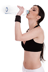 Image showing fitness woman drinking water