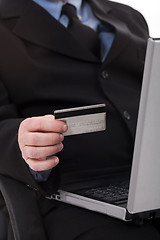 Image showing Business man with credit card focus on card