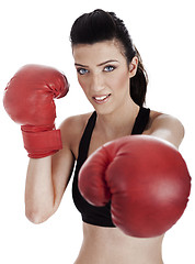 Image showing Woman boxer giving a punch