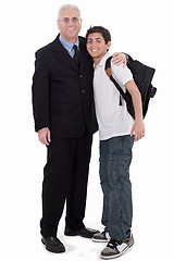 Image showing Old business man embraces a teenager