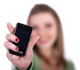 Image showing Female showing her cell phone