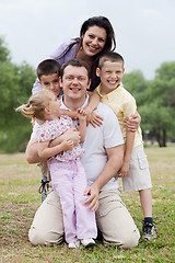 Image showing Close up shot of cheerful family posing together