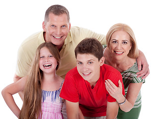 Image showing Happy family smiling towards the camera