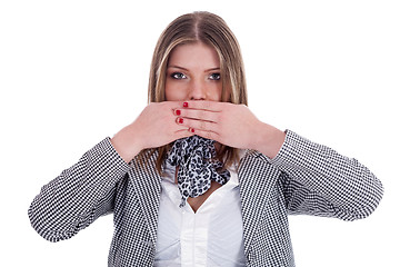 Image showing Closeup of young professional  women covering her mouth with both hands