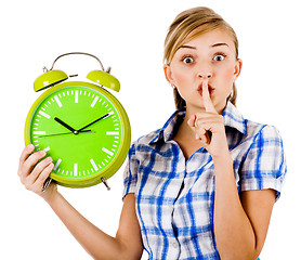 Image showing Girl with the clock asking us to maintain silence