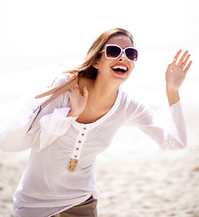 Image showing Happy young woman having fun at the beach