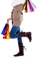 Image showing lady standing with shopping bags
