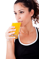 Image showing fitness girl drink a fresh juice