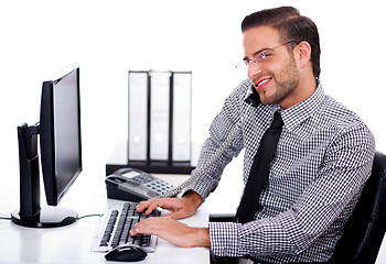 Image showing Busy professional using telephone while at work