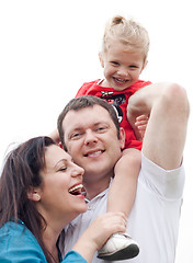 Image showing Happy couple with their beautiful daughter sitting on her father's shoulder