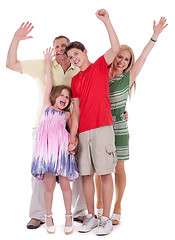 Image showing Happy family raising their hands and having fun