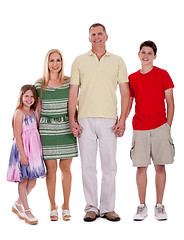 Image showing happy family standing by holding their hands