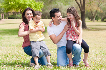 Image showing Happy family enjoying in a park