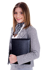 Image showing Young professional woman holding her office files