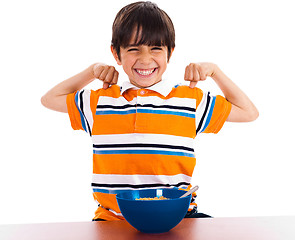 Image showing young little boy showing his strength