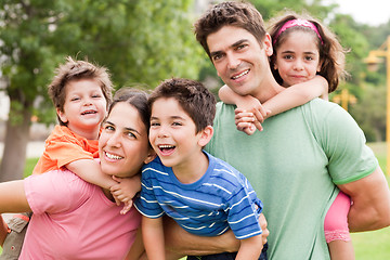 Image showing Kids enjoying piggyback ride