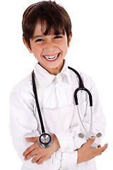 Image showing Little cacasian boy wearing doctor coat