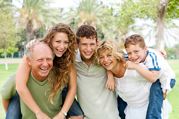 Image showing Young generation enjoying piggyride