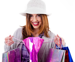 Image showing Woman showing her shopping bags