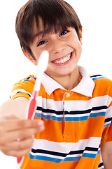 Image showing Boy showing the toothbrush