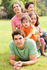 Image showing Affectionate family enjoying outdoors