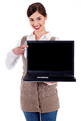 Image showing woman showing laptop