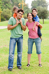 Image showing Couple giving piggyback ride