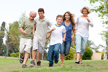 Image showing Happy family enjoying outdoors