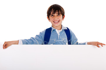 Image showing Charming kid holding blank board