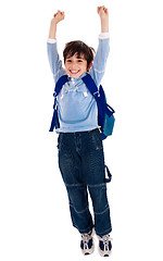 Image showing School boy raising his arms in joy