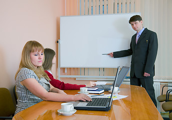 Image showing Young man to speak at a meeting