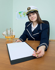Image showing Girl in a sea uniform with tablet