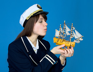 Image showing Girl blowing on sails