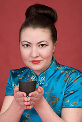 Image showing Japanese girl with teacup