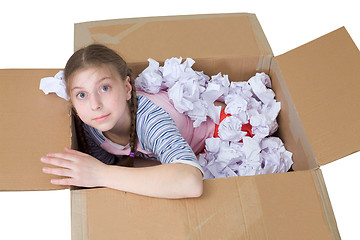 Image showing Girl in cardboard box