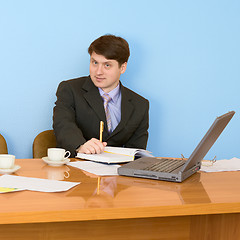 Image showing Business team sits at the table