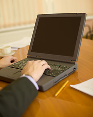 Image showing Business people planning on the laptop