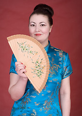 Image showing Japanese girl with fan