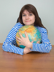 Image showing Girl in a stripped vest and globe