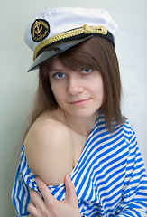 Image showing Beautiful girl in a stripped vest and cap