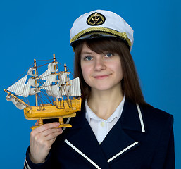 Image showing Woman with uniform cap and the ship