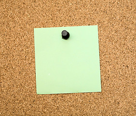 Image showing Stickers pinned to a cork board