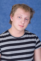 Image showing Tousled guy in a striped T-shirt