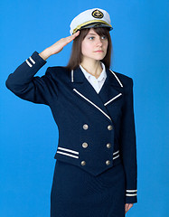 Image showing Girl in a sea uniform salutes