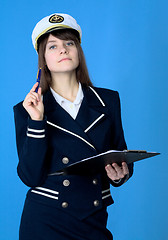 Image showing Girl in sea uniform with tablet