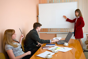 Image showing Young woman to speak at a meeting