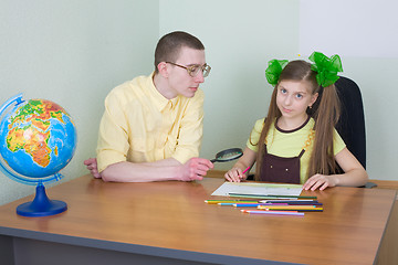 Image showing Girl and brother with colour pencils