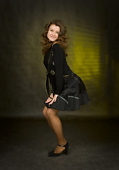 Image showing beauty girl in black on dark background