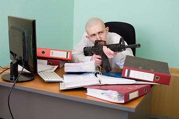 Image showing Accountant armed with a rifle