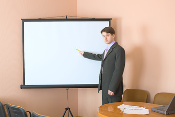 Image showing Businessman near the white screen